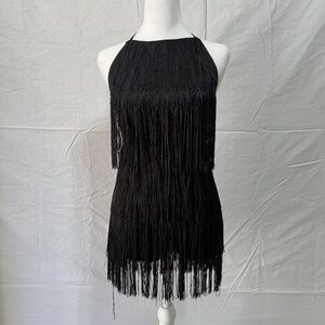 Chic black romper featuring playful Frills!